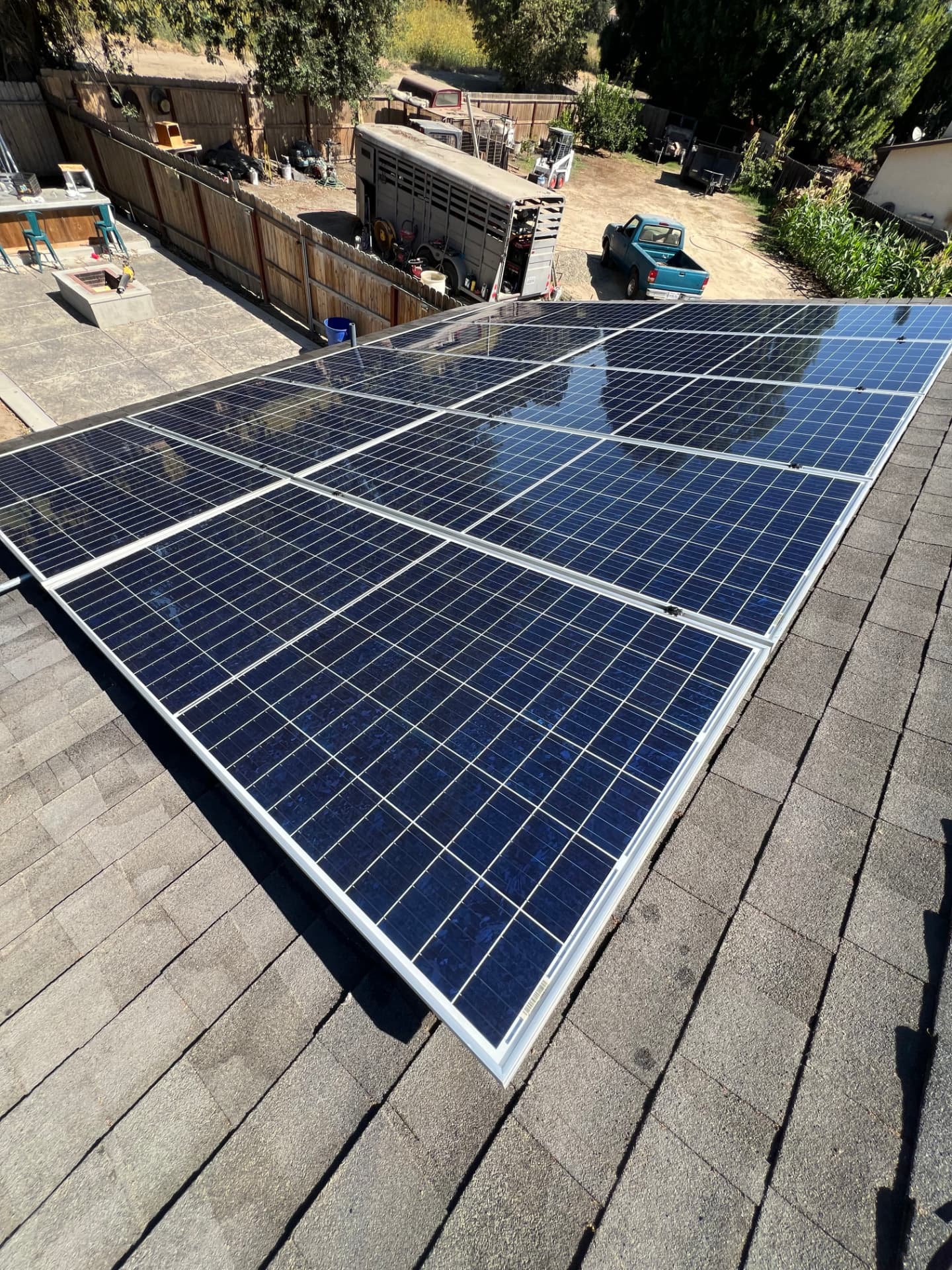 Large solar array cleaned spotless on a shingle roof