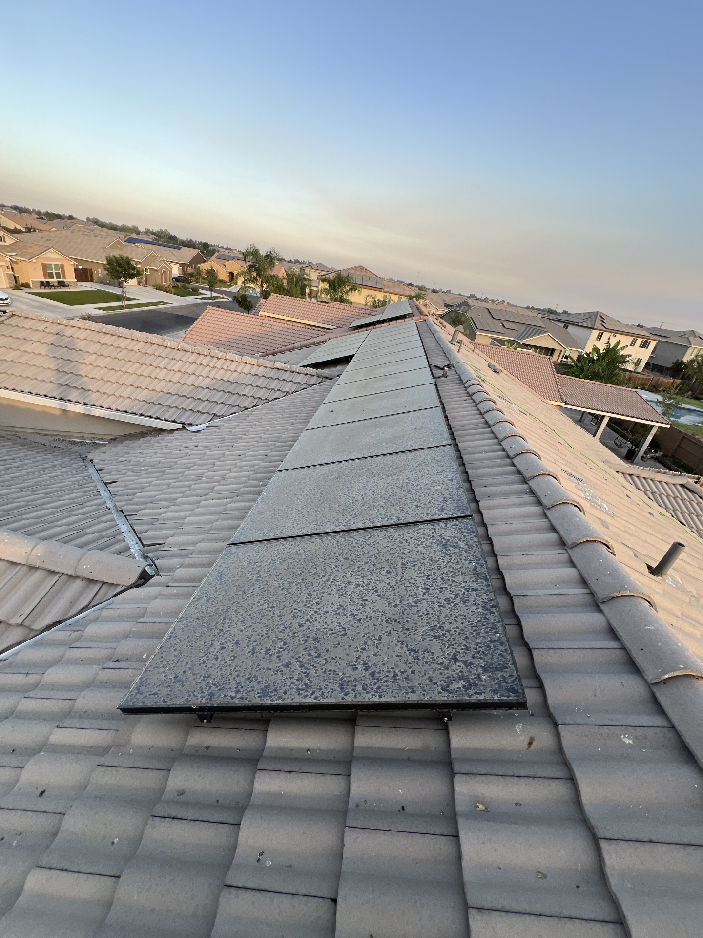 Dirty solar panels covered in dust and bird droppings before cleaning